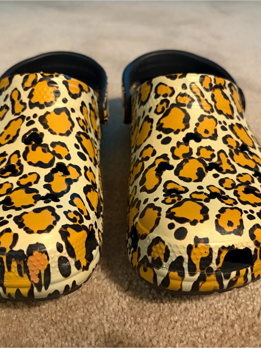 CROCS Leopard Print Clogs in Yellow, Black, Cream